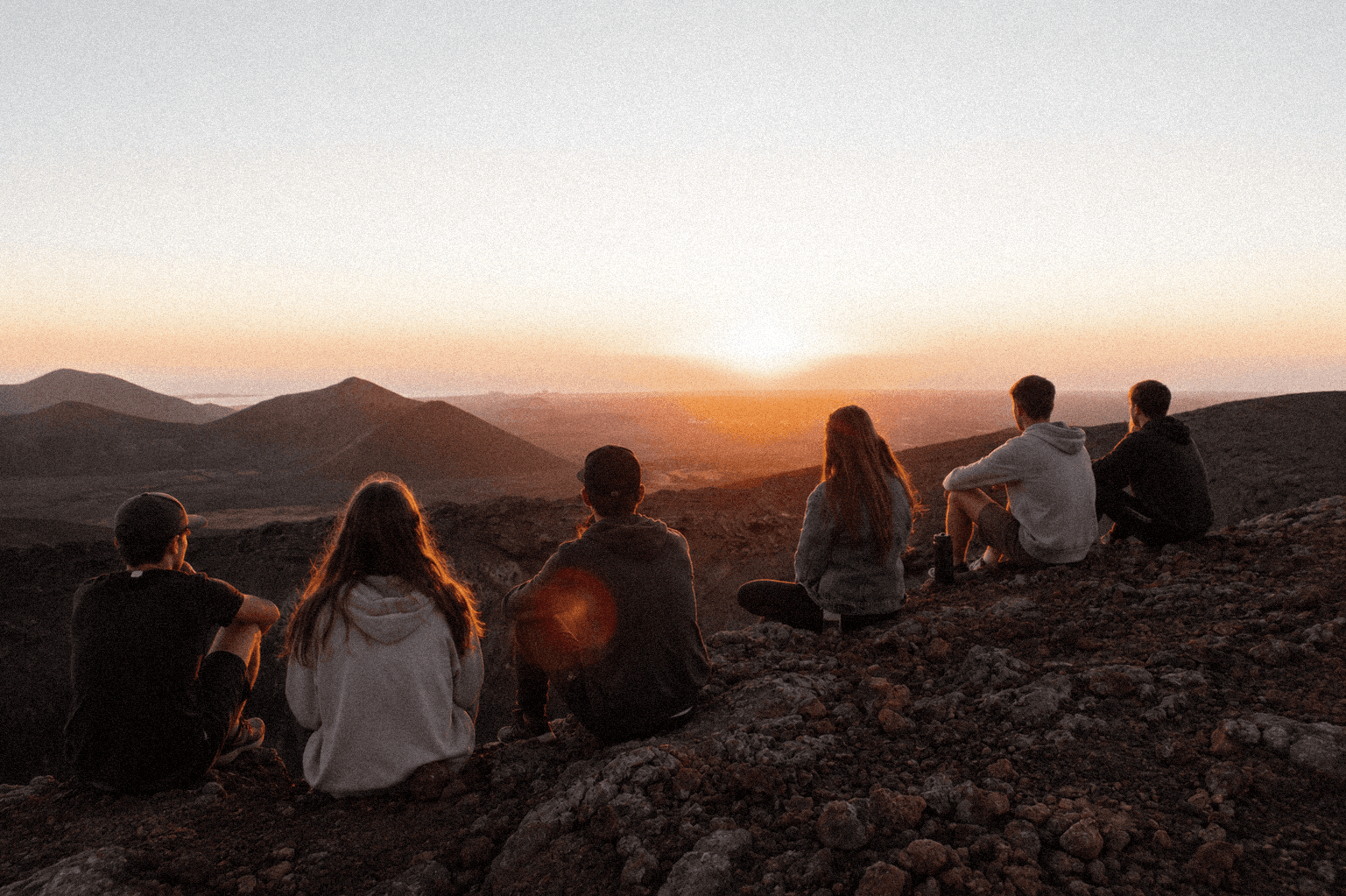 Group at Lanzarote volcano at sunset